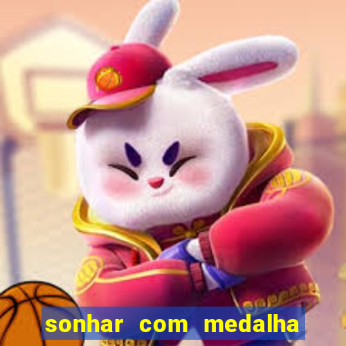 sonhar com medalha de santo